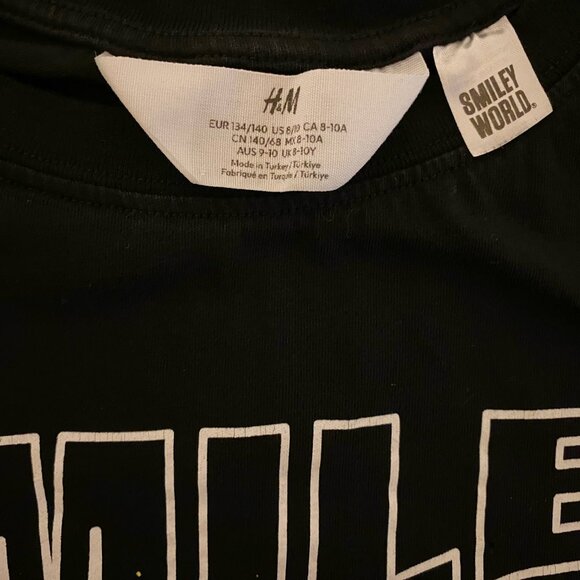 H&M x Smiley World Smiley Face Graphic Black Yellow Paint Drip Youth Tee 8/10 - Picture 4 of 6